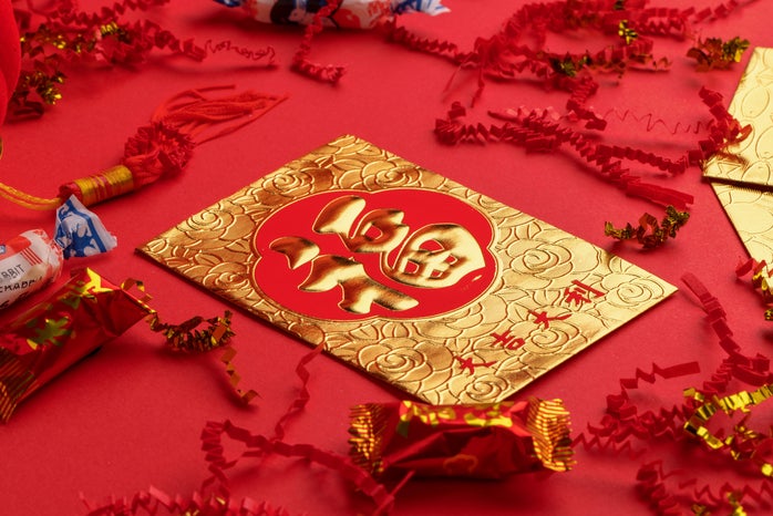 Red Packet surrounded by sweets