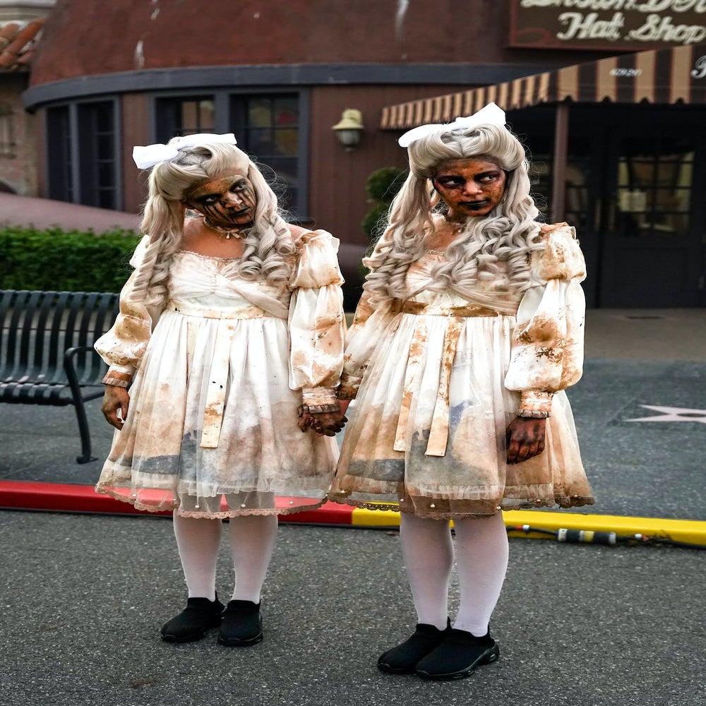 Creepy twins wearing white