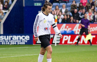 harry styles playing soccer