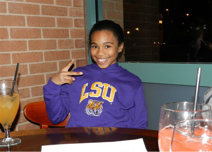 little girl in college sweatshirt