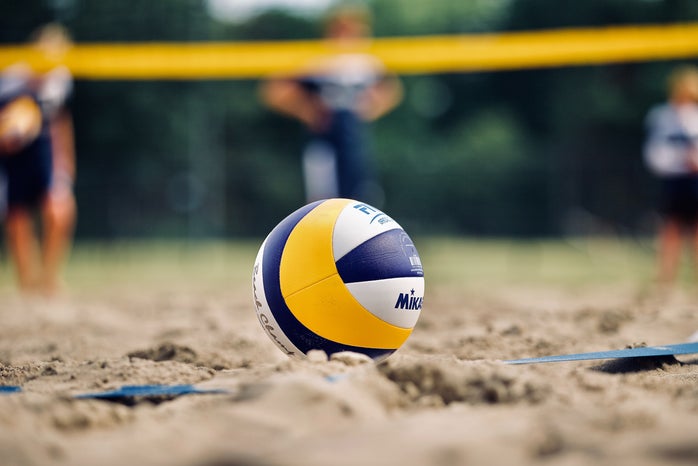beach volleyball court by Unsplash?width=698&height=466&fit=crop&auto=webp