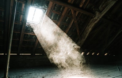 attic with light streaming in from window