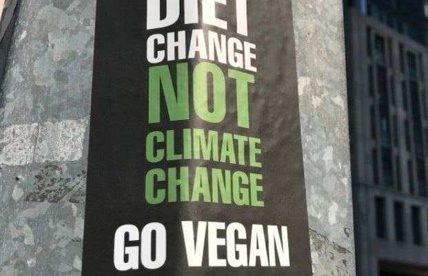 \"Diet Change not climate change; go vegan\" sign
