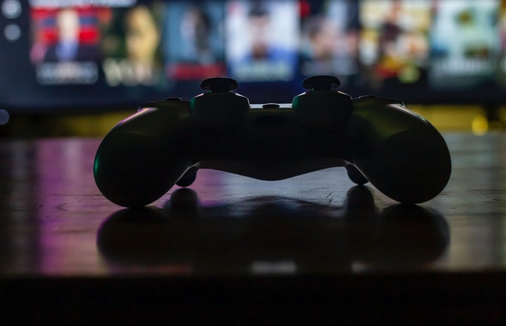 gaming controller on table by Designnnco on Unsplash?width=719&height=464&fit=crop&auto=webp