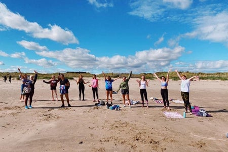 Women at a beach workout