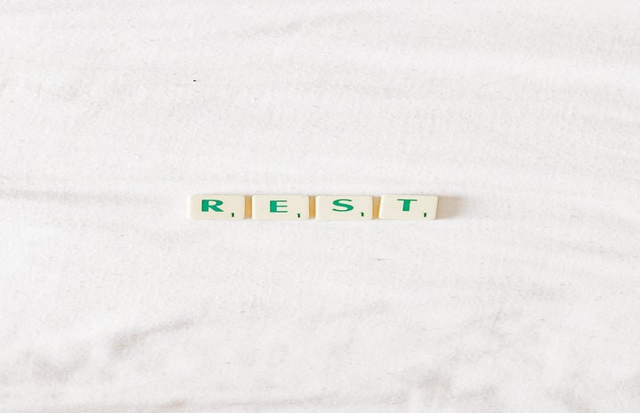 Tiles spelling out the word 'rest'