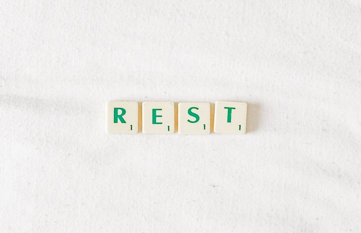 Tiles spelling out the word 'rest'