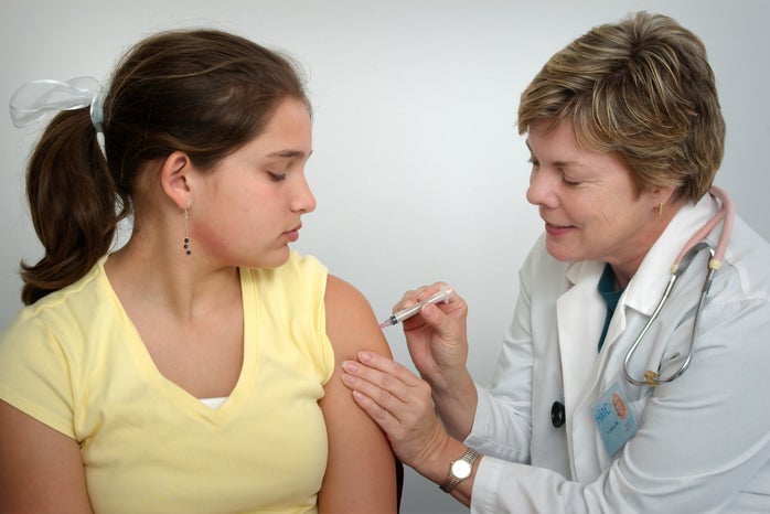 doctor giving girl vaccination by Unsplash?width=698&height=466&fit=crop&auto=webp