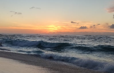 Sunset and waves in Hawaii at Sunset Beach