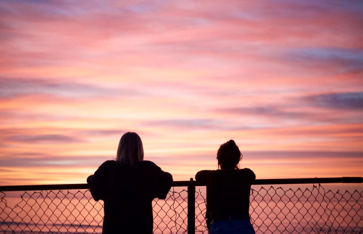 Silhouette of two people at sunset by Tori Wise?width=719&height=464&fit=crop&auto=webp
