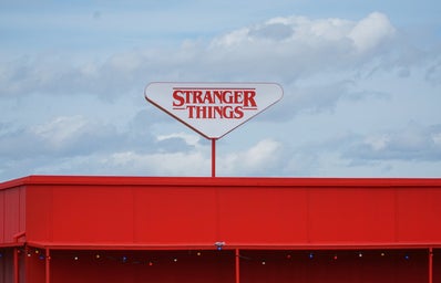 A building sign that reads \"Stranger Things.\"
