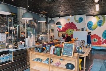 coffee shop coffee bar with colorful mural on the wall