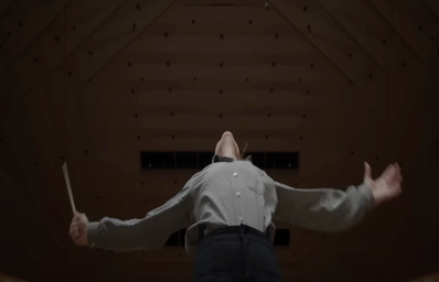Low angle shot of a woman conducting.
