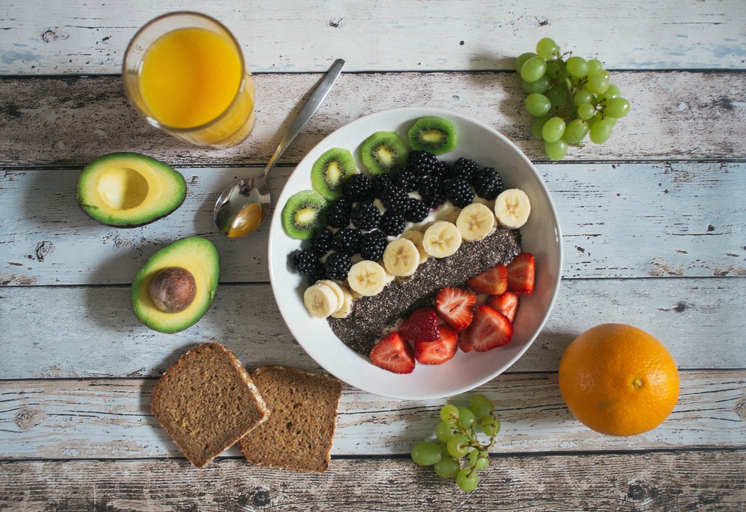 Bowl of chia seed pudding topped with fruit