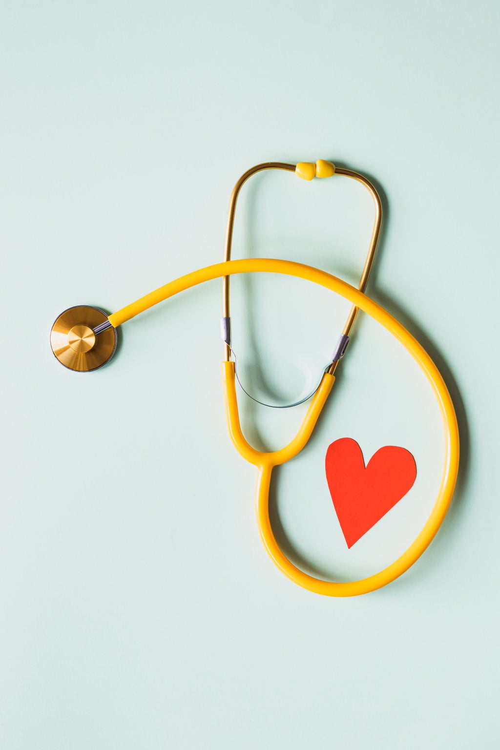 Yellow Stethoscope with red heart