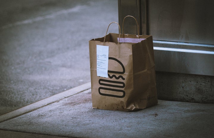 food delivery bag outside door by Jon Tyson via Unsplash?width=719&height=464&fit=crop&auto=webp