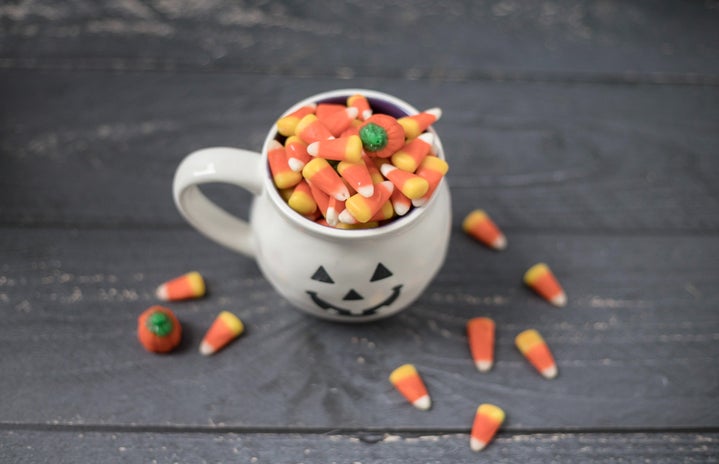 mug filled with candy corn by Sarah Gualtieri?width=719&height=464&fit=crop&auto=webp