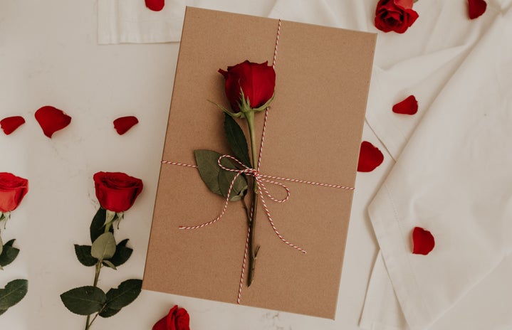 red roses on brown envelope
