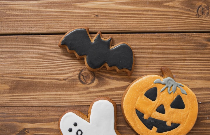Halloween Cookies On Wooden Surface