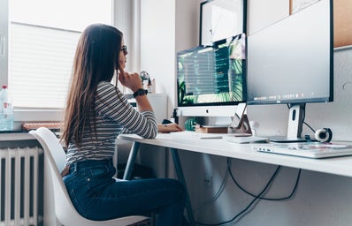 Woman working at desktop computer