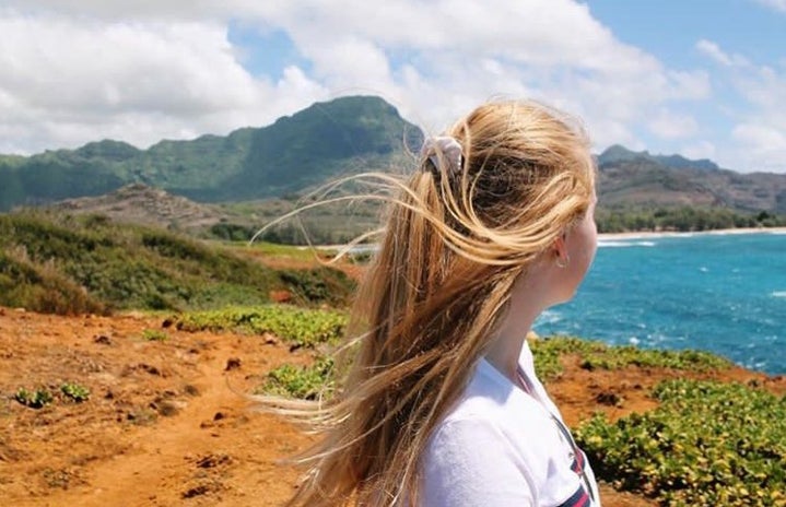 charlotte reader landscape ocean hair blowing nature travel adventure sunny?width=719&height=464&fit=crop&auto=webp