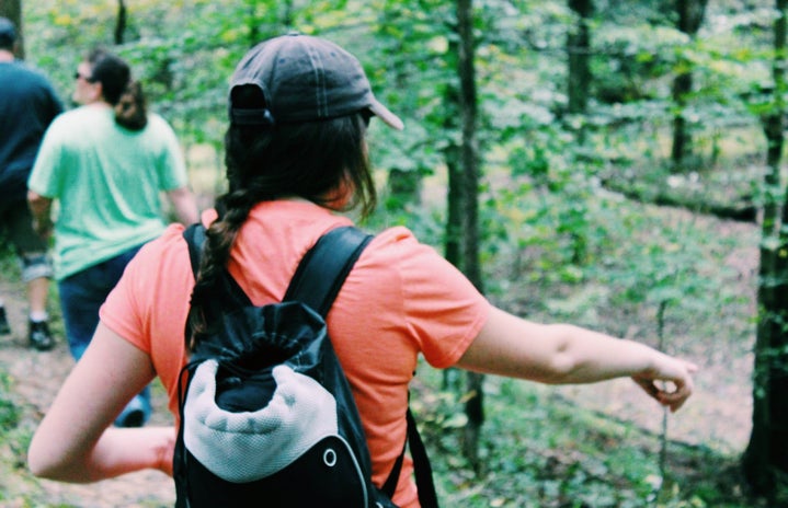 girl pointing at nature