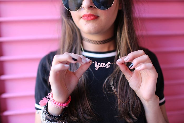molly longest yas necklace red lips sunglasses pink wall?width=698&height=466&fit=crop&auto=webp