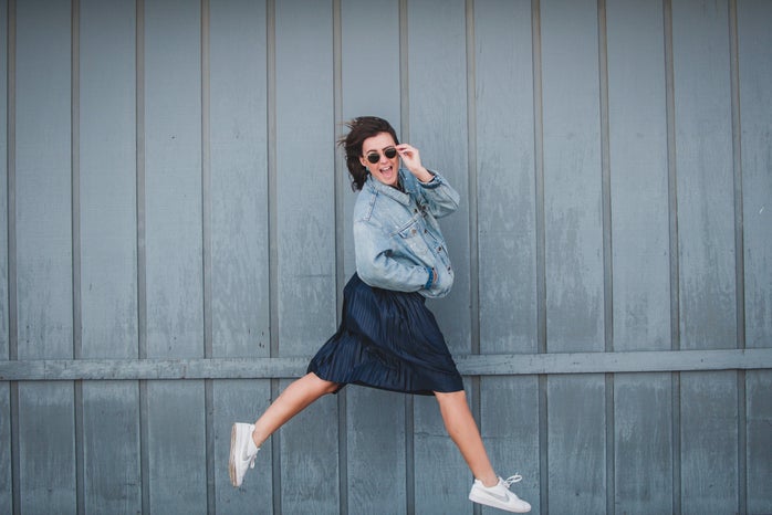 taylor thoman taylor thoman girl with jean jacket and skirt jumping 2?width=698&height=466&fit=crop&auto=webp