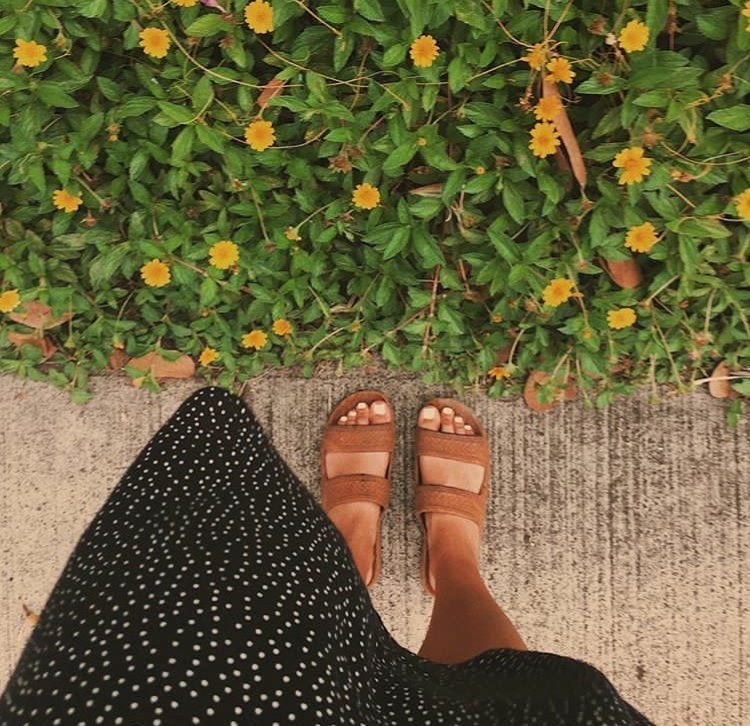 sandals sidewalk flowers