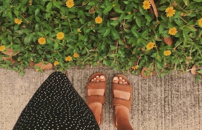 sandals sidewalk flowers