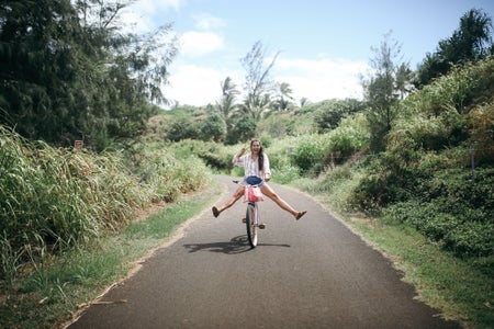hawaii girl happy biking fun peace