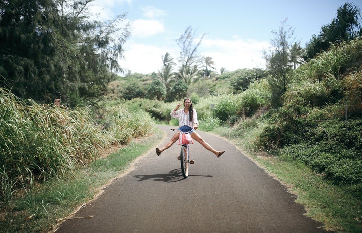 hawaii girl happy biking fun peace