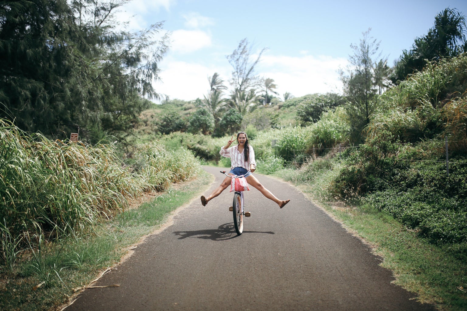 hawaii girl happy biking fun peace