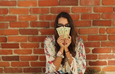 Kellyn Simpkin-Girl Holding Money
