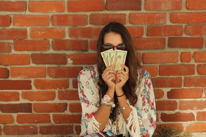 Kellyn Simpkin-Girl Holding Money
