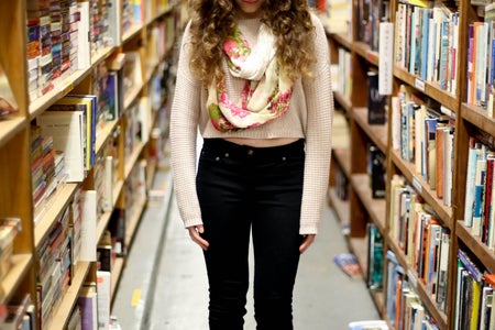 Girl In Library By Books