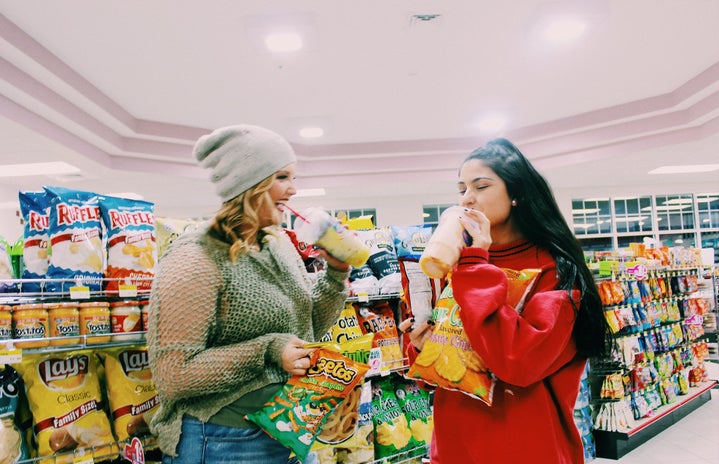 Anna Schultz girls in gas station with junk food?width=719&height=464&fit=crop&auto=webp
