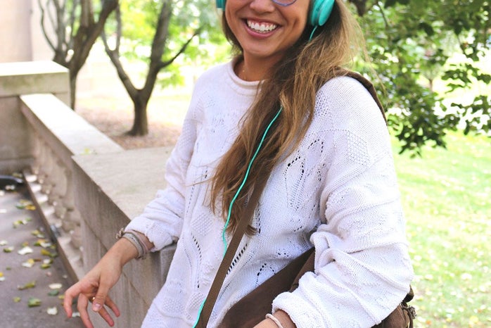 the lala girl with brown backpack and headphones?width=698&height=466&fit=crop&auto=webp