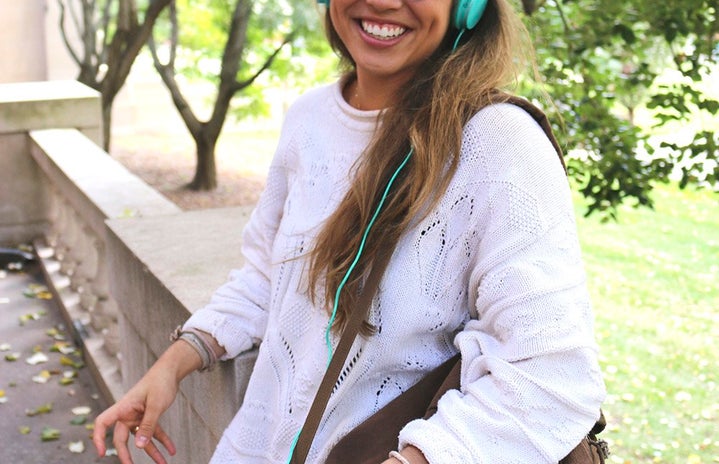the lala girl with brown backpack and headphones?width=719&height=464&fit=crop&auto=webp