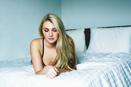 Girl Lying On Bed