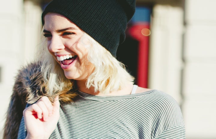 arianna tucker girl laughing with beanie?width=719&height=464&fit=crop&auto=webp