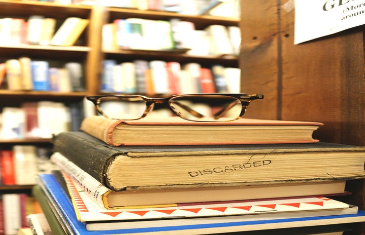 the lala stalk of books and glasses?width=719&height=464&fit=crop&auto=webp
