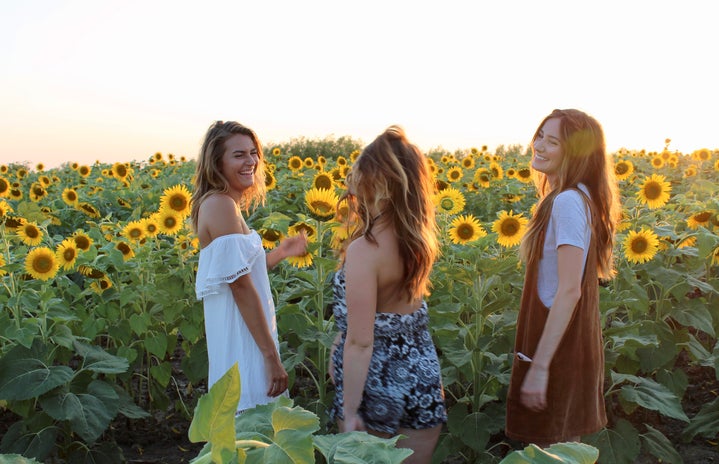 Maria Scheller laughing friends silly fun sunflower summer dress happy?width=719&height=464&fit=crop&auto=webp