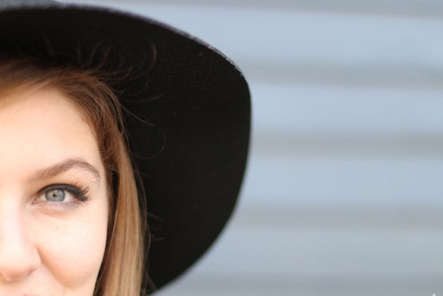the lala half of girls face with big hat?width=698&height=466&fit=crop&auto=webp