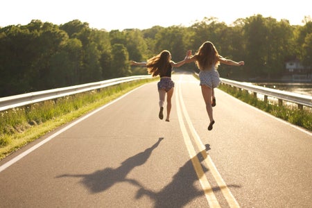Kayla Bacon-Dramatically Skipping Down Road