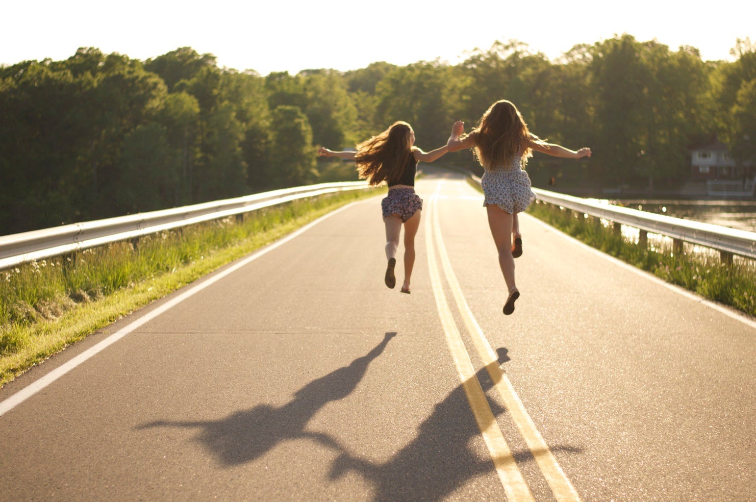 Kayla Bacon-Dramatically Skipping Down Road
