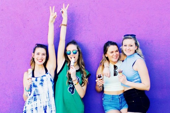 Amelia Kramer happy friends hrowing the peace sign and eating ice cream?width=698&height=466&fit=crop&auto=webp
