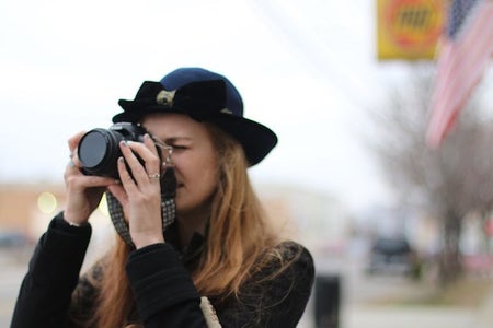 The Lalagirl In Hat Taking A Photo