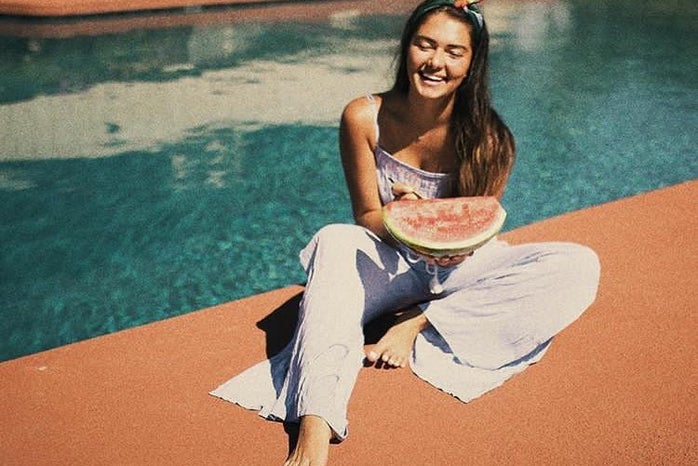 tessa pesicka girl laughing watermelon pool summer?width=698&height=466&fit=crop&auto=webp