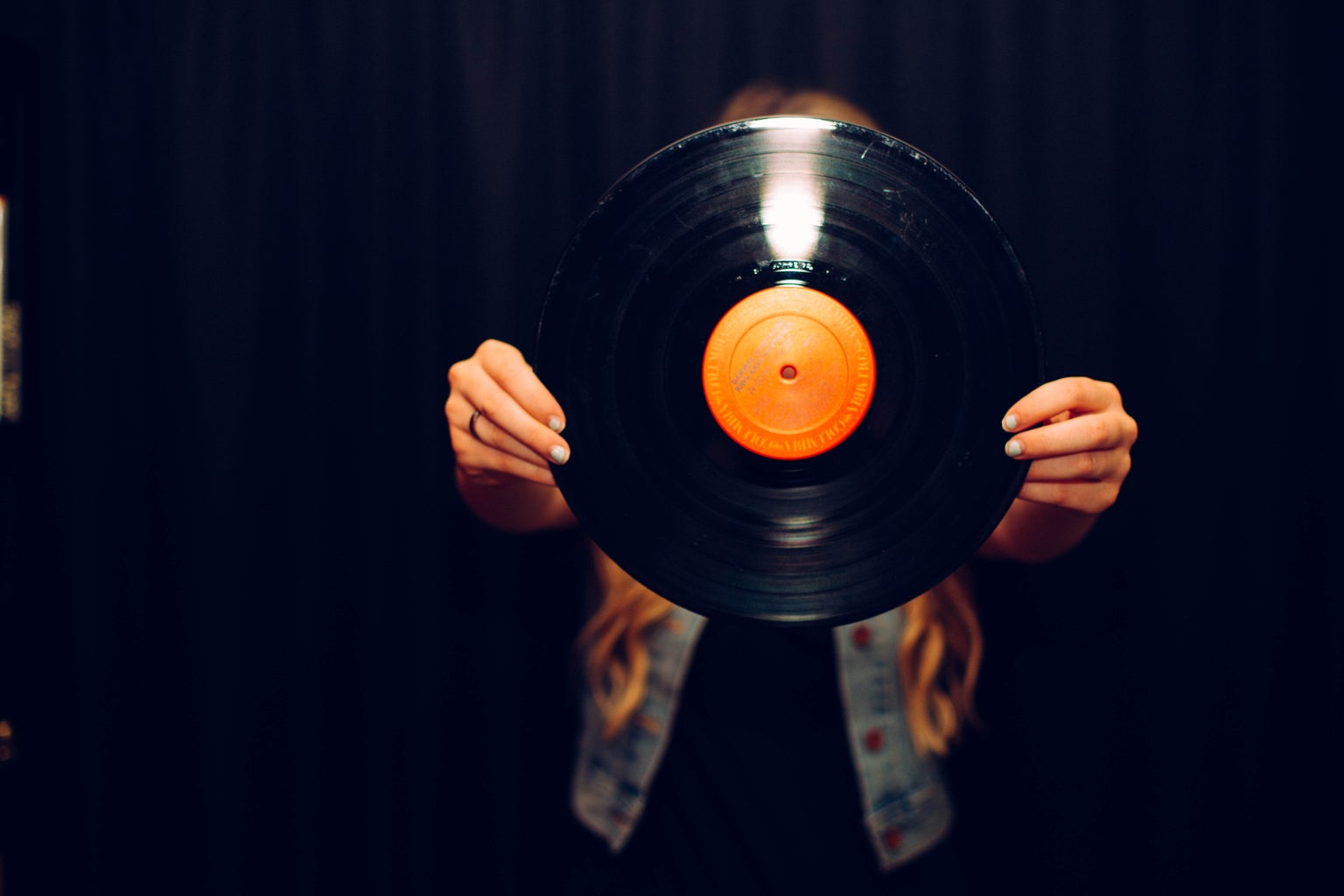 Girl Holding Vinyl Record